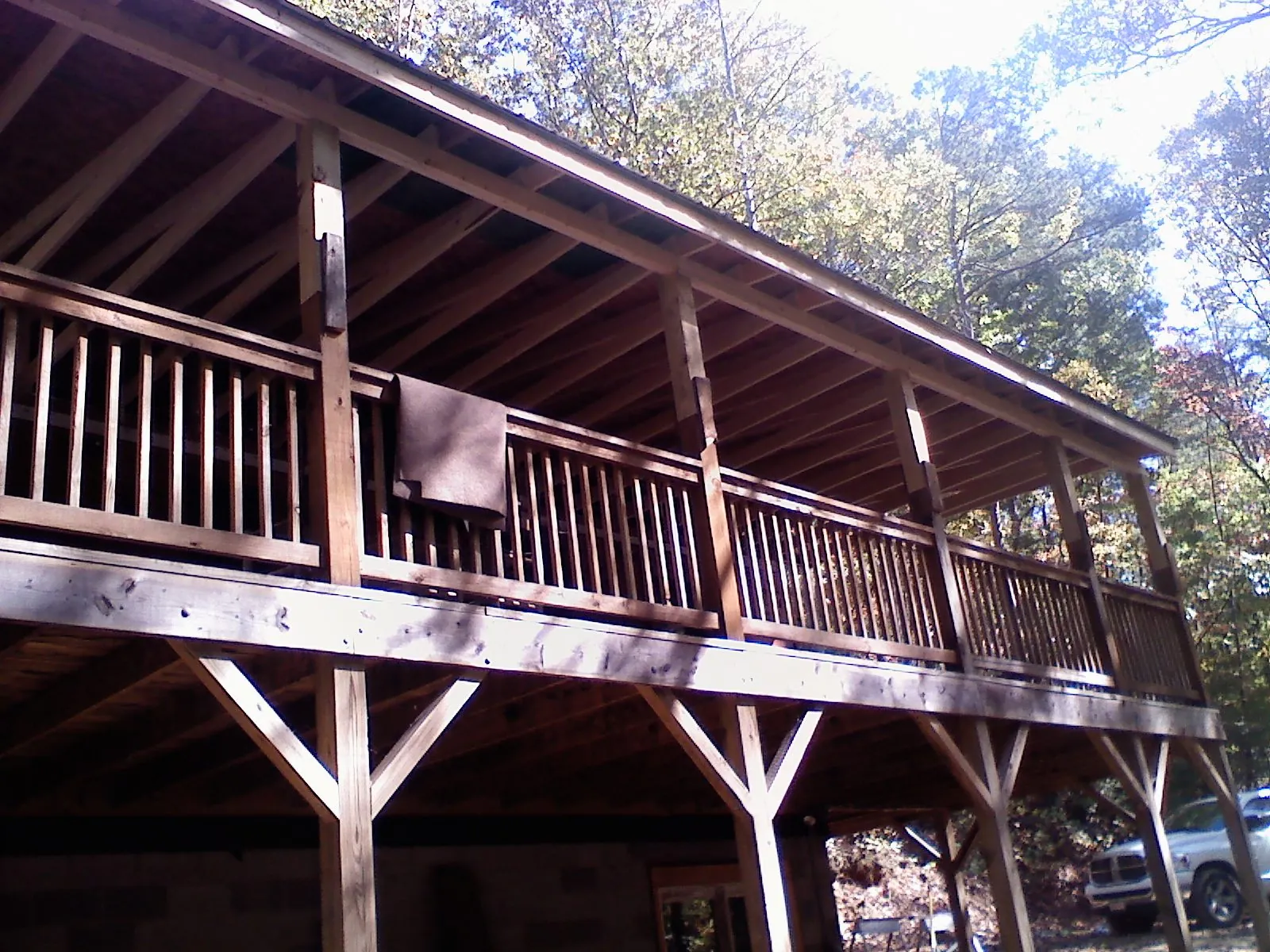Timber framing under a new elevated porch and deck — Roof Leak Repair in Cliffside by Roofing Brothers